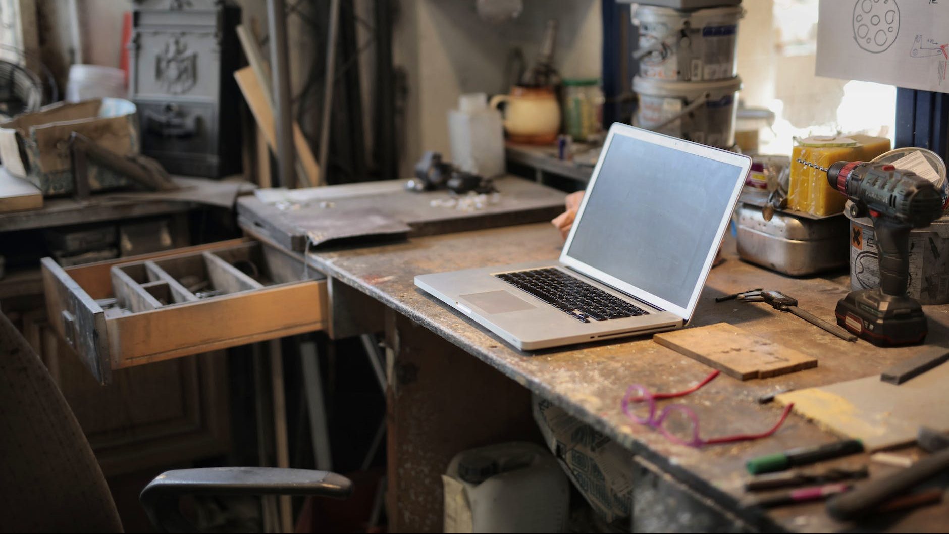 laptop on table in workshop